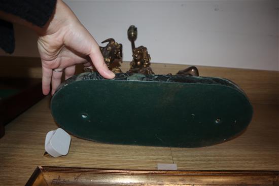 A bronzed metal classical figural lamp on marble base, modelled as a lady feeding a goat length 37cm